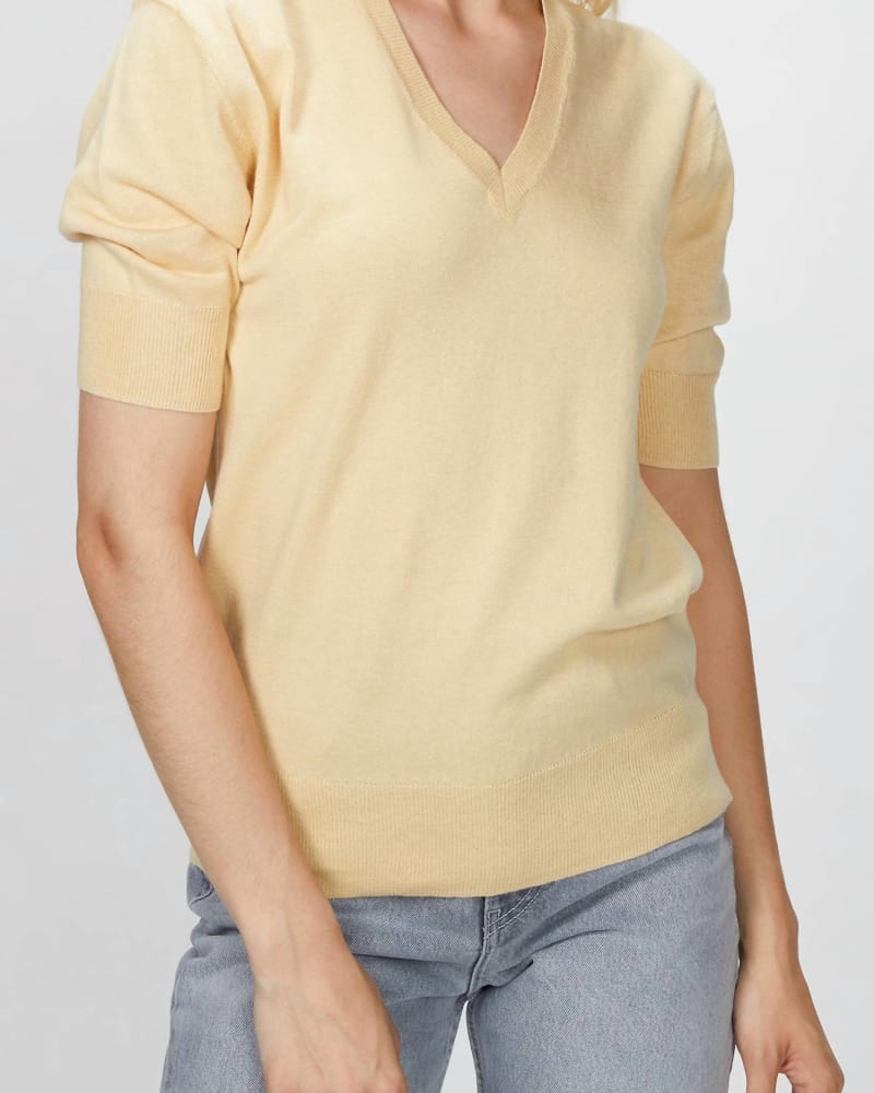 Front of a model wearing a size L Elbow V-Neck Top in Honey in Honey by 6397. | dia_product_style_image_id:333518